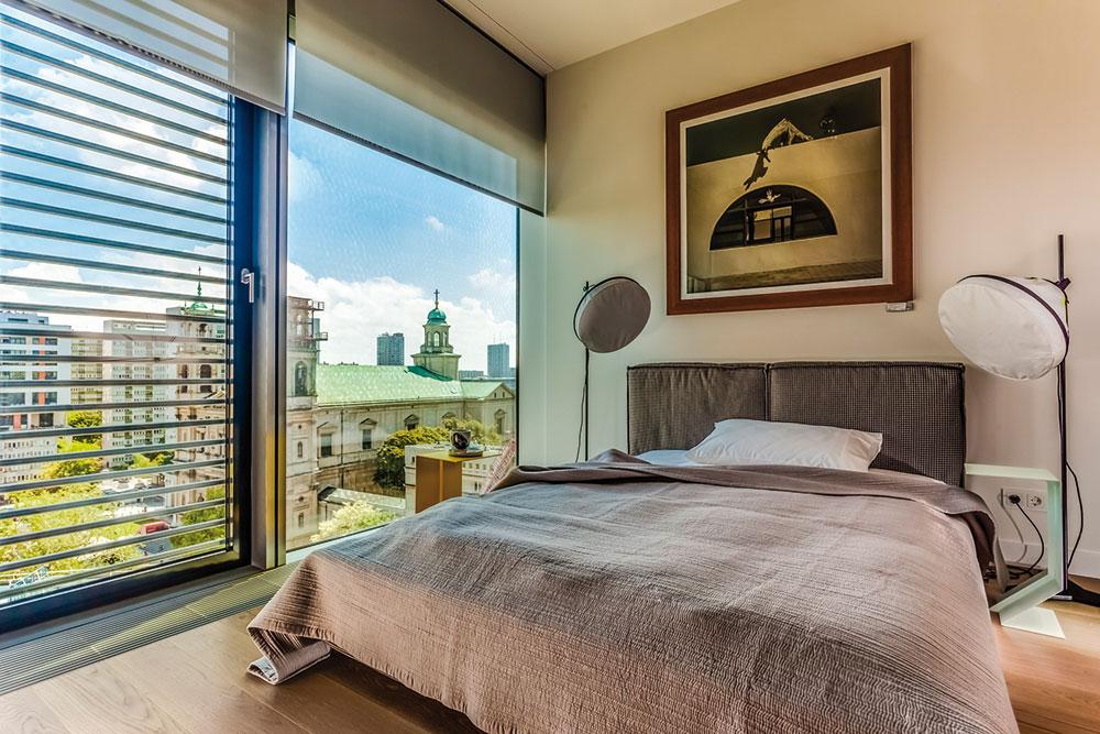 4960 roller blind in a contemporary bedroom setting Silent Gliss 4960 roller blind in a modern bedroom with floor-to-ceiling windows